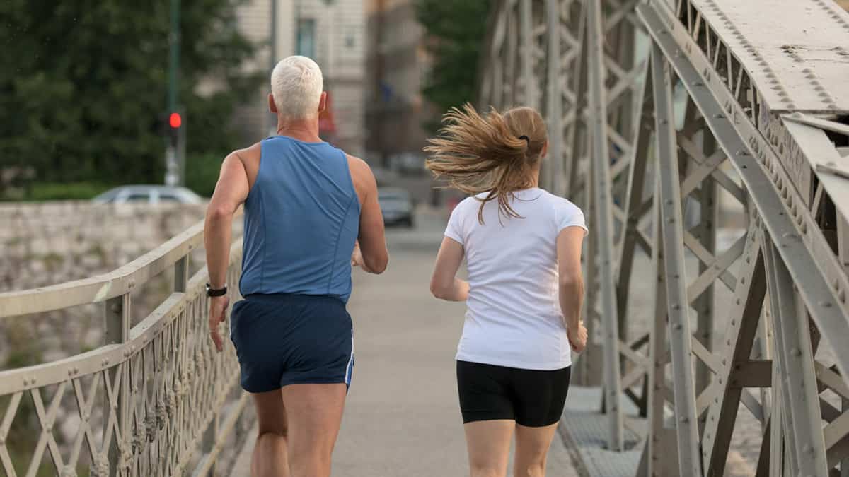 Middle aged couple jogging