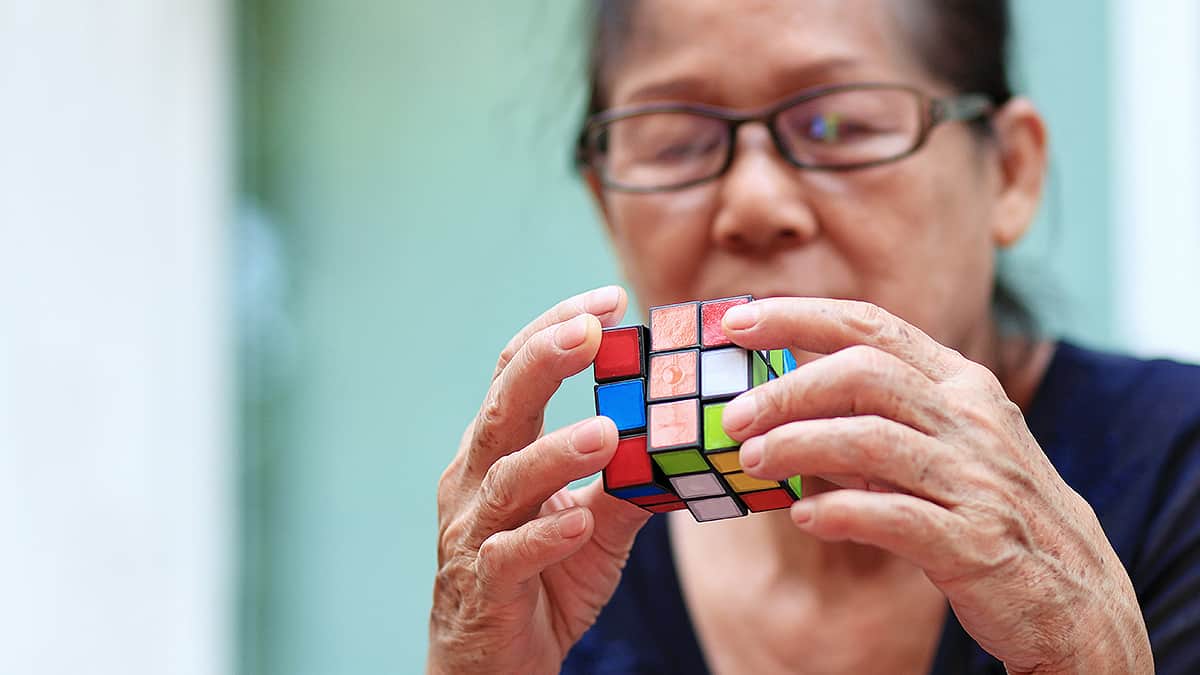 Elder with rubik's cube