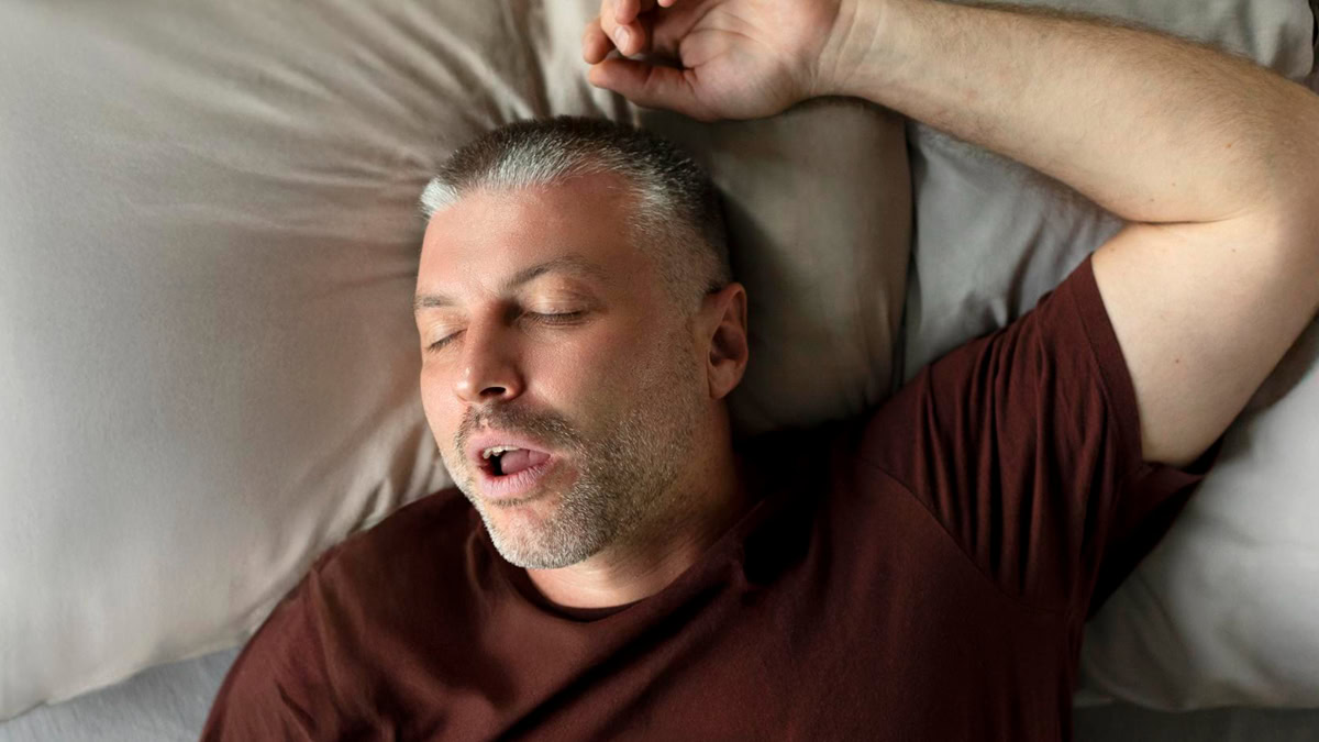 Person sleeping in his bed