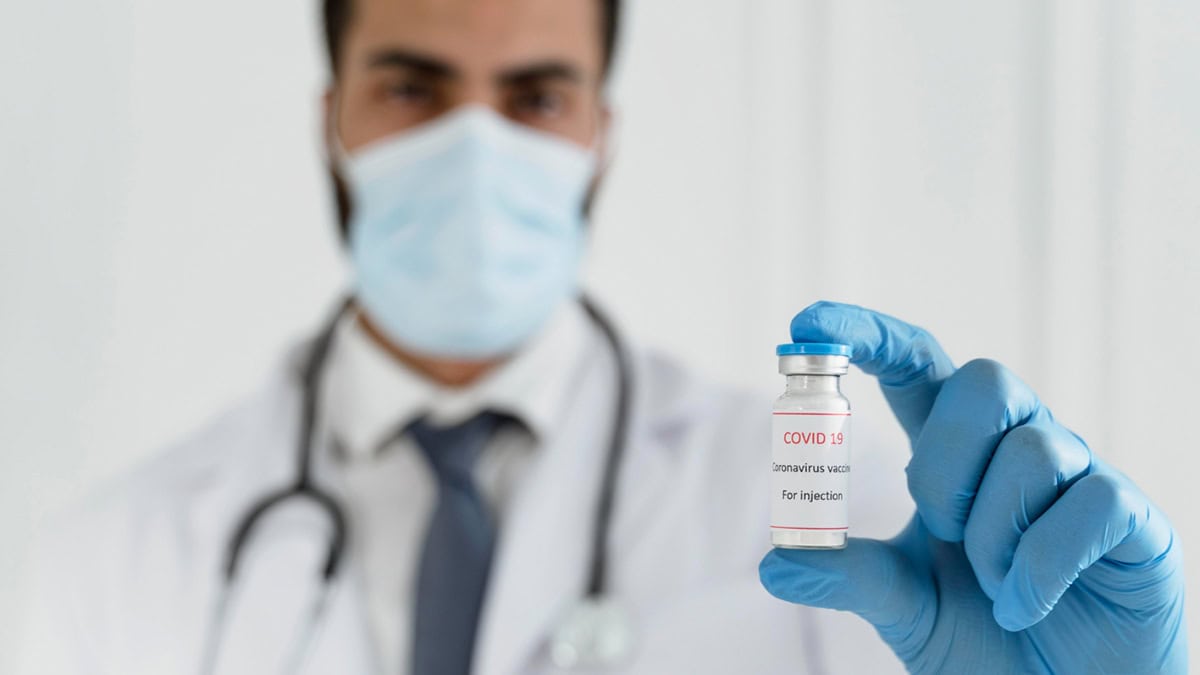 Doctor with COVID-19 medication