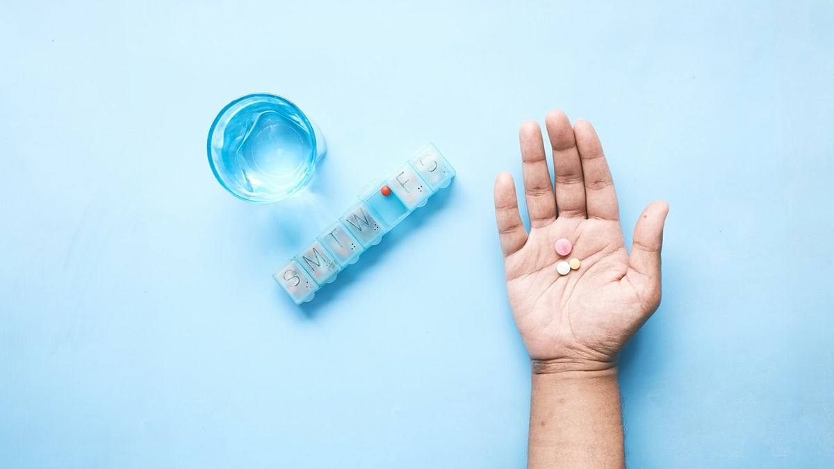 Person holding medication
