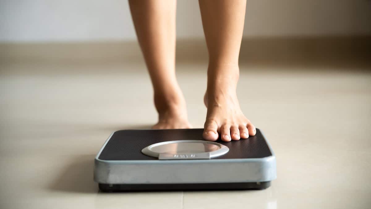 Person on weight scale